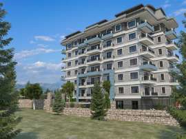 Новые квартиры в Демирташе, Алания, в современном комплексе с собственным пляжем