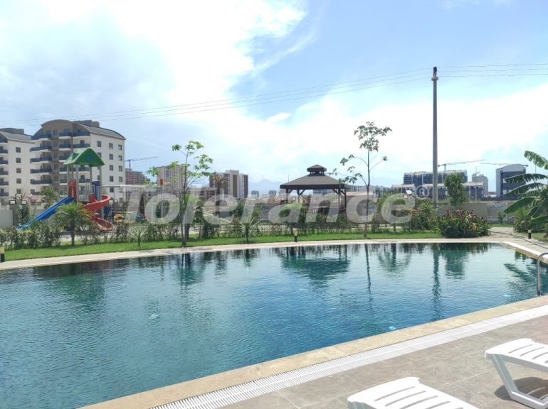 Квартира в Алтынташ, Анталия с бассейном: купить недвижимость в Турции - 109754