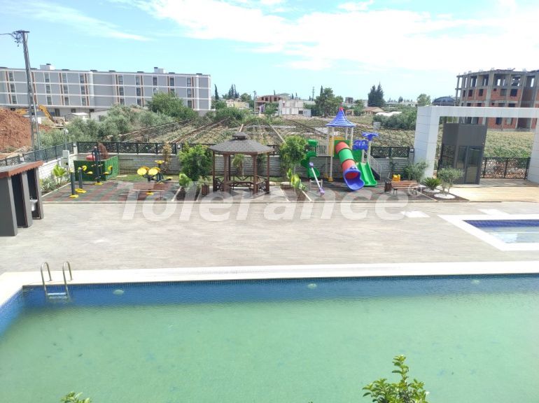 Квартира в Алтынташ, Анталия с бассейном: купить недвижимость в Турции - 109809