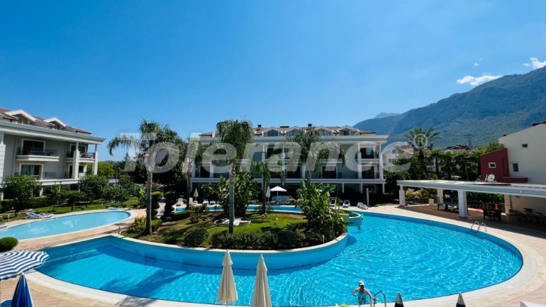 Квартира в Арсланбуджак, Кемер с бассейном: купить недвижимость в Турции - 104064