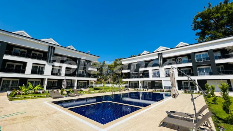 Квартира от застройщика в Арсланбуджак, Кемер с бассейном: купить недвижимость в Турции - 110947