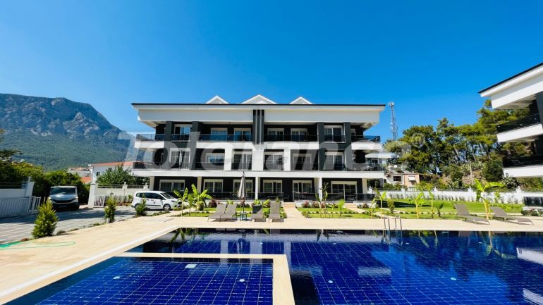 Квартира от застройщика в Арсланбуджак, Кемер с бассейном: купить недвижимость в Турции - 110948