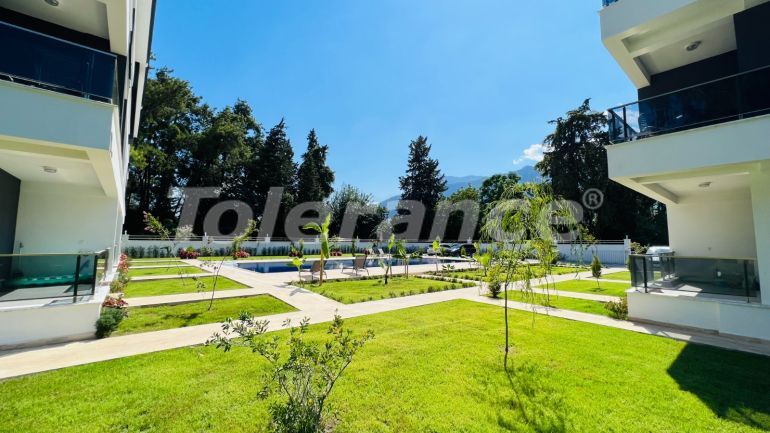 Квартира от застройщика в Арсланбуджак, Кемер с бассейном: купить недвижимость в Турции - 110950