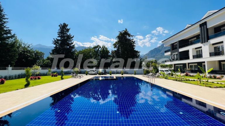 Квартира от застройщика в Арсланбуджак, Кемер с бассейном: купить недвижимость в Турции - 110951