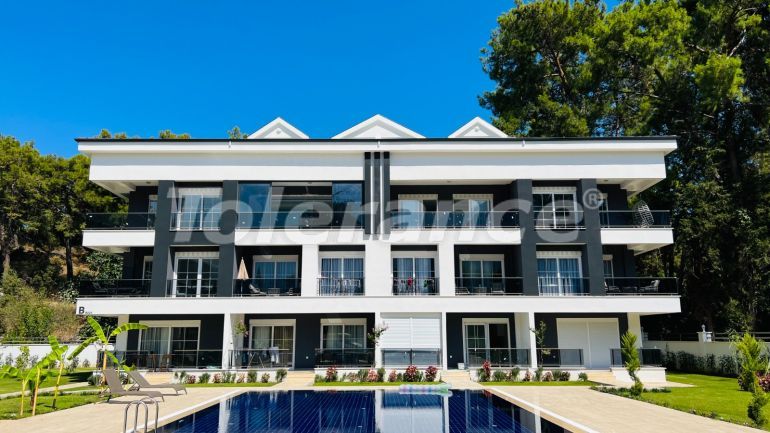 Квартира от застройщика в Арсланбуджак, Кемер с бассейном: купить недвижимость в Турции - 110954