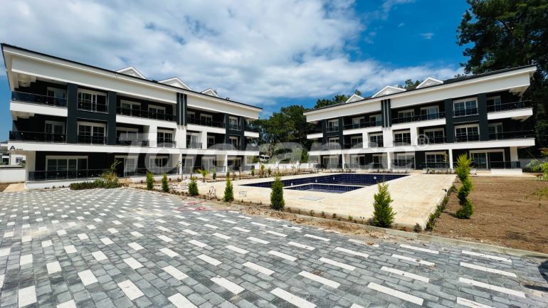 Квартира от застройщика в Арсланбуджак, Кемер с бассейном: купить недвижимость в Турции - 110955