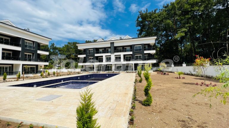 Квартира от застройщика в Арсланбуджак, Кемер с бассейном: купить недвижимость в Турции - 110956