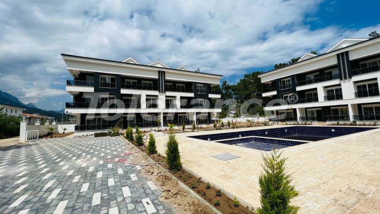 Квартира от застройщика в Арсланбуджак, Кемер с бассейном: купить недвижимость в Турции - 110957