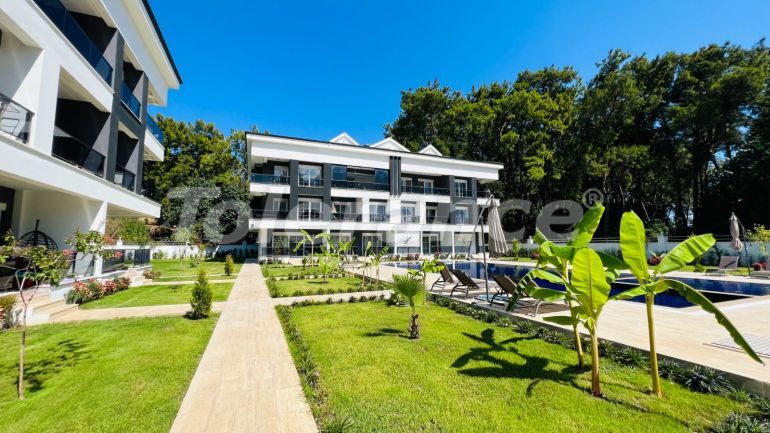 Квартира от застройщика в Арсланбуджак, Кемер с бассейном: купить недвижимость в Турции - 110958