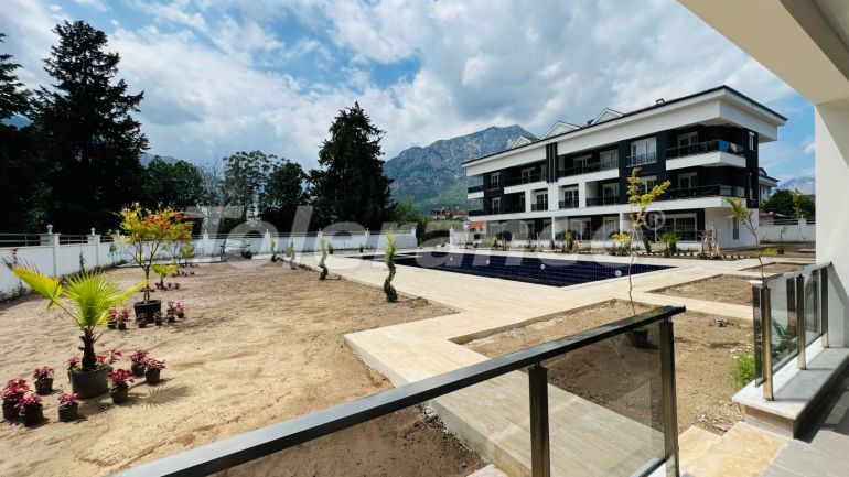 Квартира от застройщика в Арсланбуджак, Кемер с бассейном: купить недвижимость в Турции - 110959