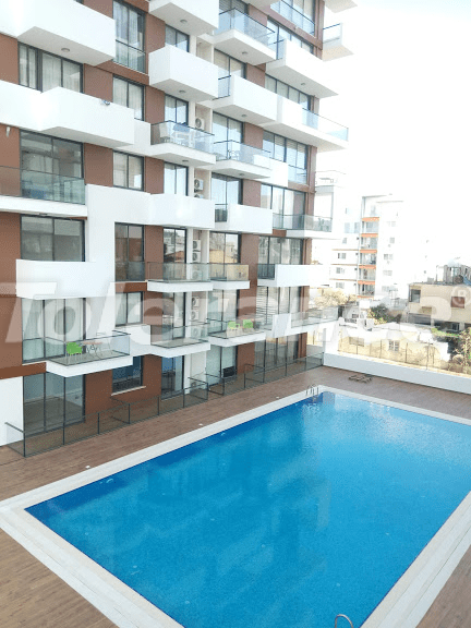 Квартира в Фамагуста, Северный Кипр с бассейном - 71383 Квартира в Фамагуста, Северный Кипр с бассейном: купить недвижимость в Турции - 71383