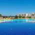 Квартира в Фамагуста, Северный Кипр вид на море с бассейном в рассрочку: купить недвижимость в Турции - 85996