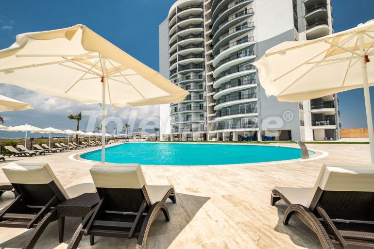 Квартира от застройщика в Фамагуста, Северный Кипр вид на море с бассейном в рассрочку - 86360 Квартира от застройщика в Фамагуста, Северный Кипр вид на море с бассейном в рассрочку: купить недвижимость в Турции - 86360