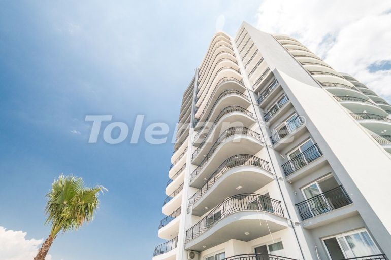 Квартира от застройщика в Фамагуста, Северный Кипр вид на море с бассейном в рассрочку - 86374 Квартира от застройщика в Фамагуста, Северный Кипр вид на море с бассейном в рассрочку: купить недвижимость в Турции - 86374