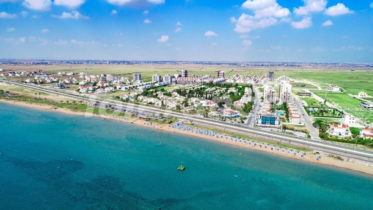 Квартира от застройщика в Фамагуста, Северный Кипр вид на море с бассейном: купить недвижимость в Турции - 86434