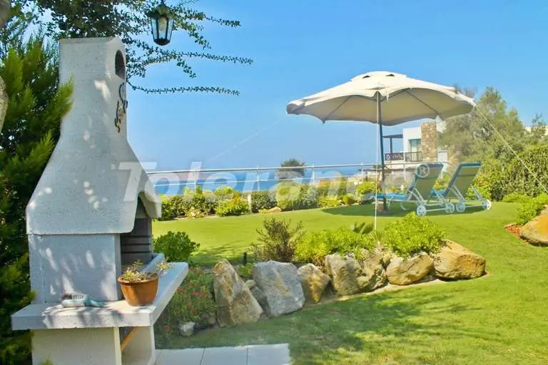 Квартира в Гюмюшлюк, Бодрум с бассейном: купить недвижимость в Турции - 7886