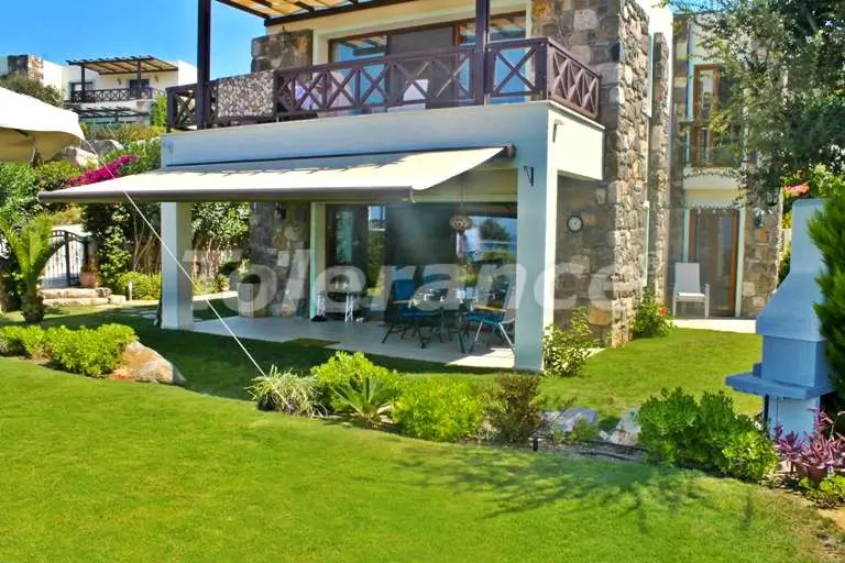 Квартира в Гюмюшлюк, Бодрум с бассейном: купить недвижимость в Турции - 7891