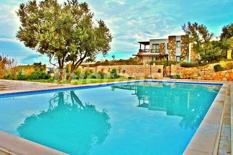 Квартира в Гюмюшлюк, Бодрум с бассейном: купить недвижимость в Турции - 7893