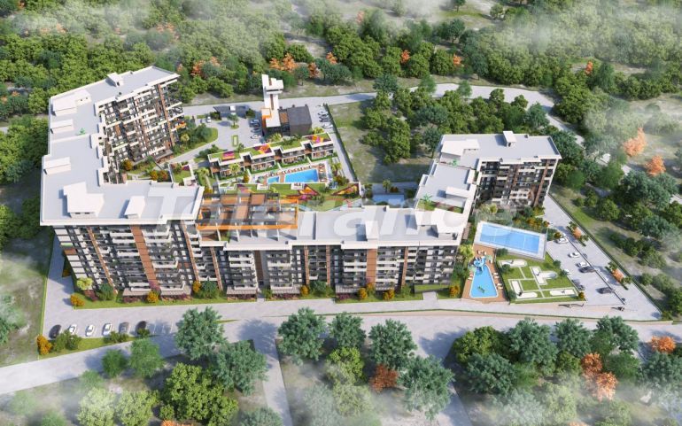 Квартира от застройщика в Измире с бассейном в рассрочку: купить недвижимость в Турции - 83700