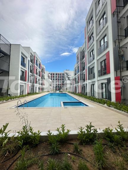 Квартира в Кепез, Анталия с бассейном: купить недвижимость в Турции - 83910