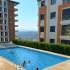 Квартира в Кепез, Анталия с бассейном: купить недвижимость в Турции - 98455