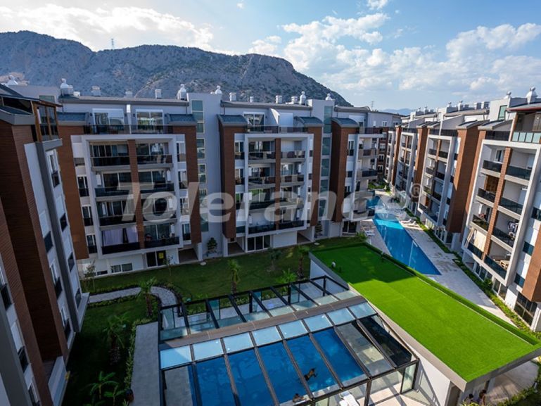 Квартира в Коньяалты, Анталия с бассейном: купить недвижимость в Турции - 103913