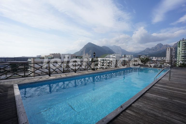 Квартира в Коньяалты, Анталия с бассейном: купить недвижимость в Турции - 130061