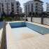Квартира в Коньяалты, Анталия с бассейном: купить недвижимость в Турции - 58665