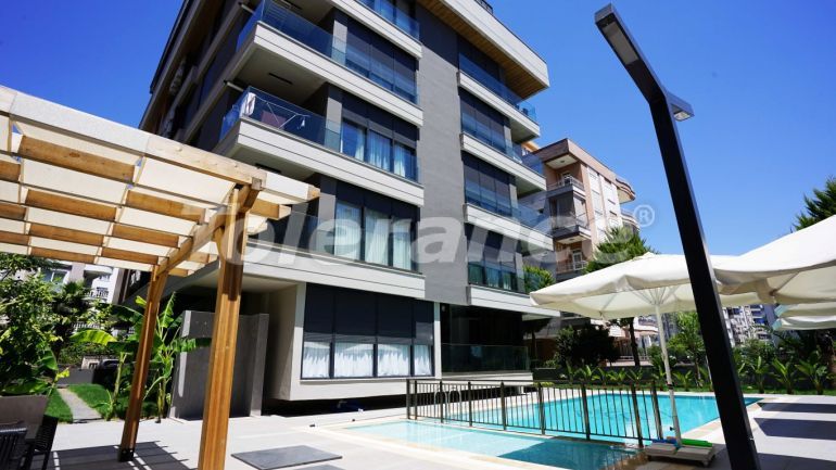 Квартира в Коньяалты, Анталия с бассейном: купить недвижимость в Турции - 95755