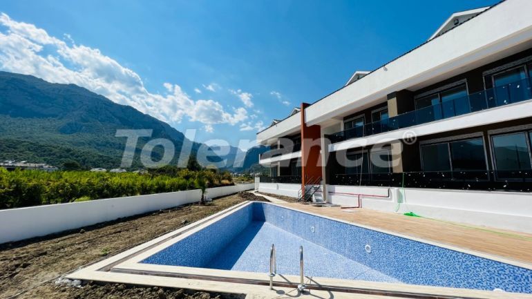 Квартира от застройщика в Куздере, Кемер с бассейном: купить недвижимость в Турции - 97300