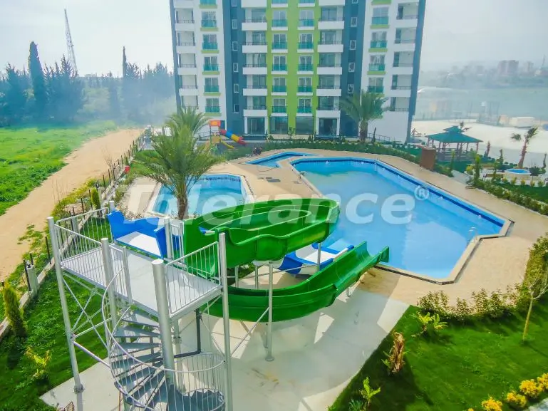 Квартира от застройщика в Тедже, Мерсин, Мерсин вид на море с бассейном - 33932 Квартира от застройщика в Тедже, Мерсин, Мерсин вид на море с бассейном: купить недвижимость в Турции - 33932