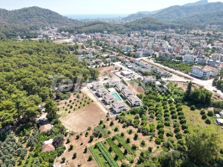 Вилла или дом от застройщика в Арсланбуджак, Кемер с бассейном: купить недвижимость в Турции - 103378