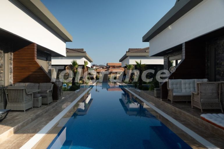 Вилла или дом от застройщика в Асланбуджак, Кемер с бассейном: купить недвижимость в Турции - 103452