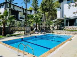 Вилла или дом в Бейджик, Кемер с бассейном: купить недвижимость в Турции - 136500