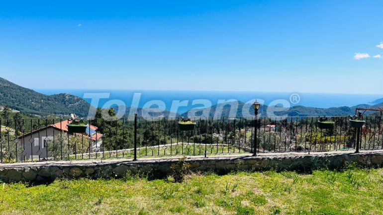 Вилла или дом в Бейджик, Кемер вид на море: купить недвижимость в Турции - 78477