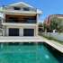 Вилла или дом в Чалыш, Фетхие с бассейном: купить недвижимость в Турции - 57549