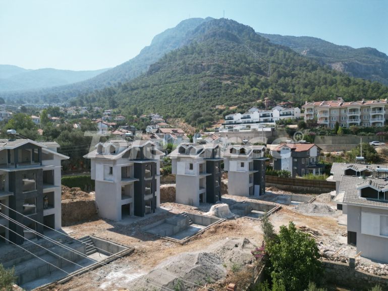 Вилла или дом от застройщика в Оваджик, Фетхие вид на море с бассейном: купить недвижимость в Турции - 67492