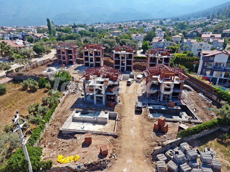 Вилла или дом от застройщика в Оваджик, Фетхие вид на море с бассейном: купить недвижимость в Турции - 67501