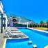 Вилла или дом в Оваджик, Фетхие вид на море с бассейном: купить недвижимость в Турции - 69967