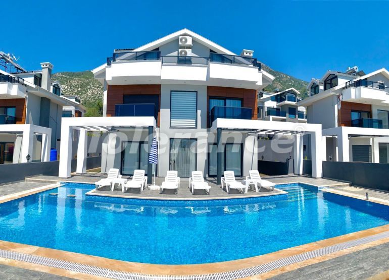 Вилла или дом в Оваджик, Фетхие вид на море с бассейном: купить недвижимость в Турции - 69974