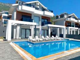 Вилла или дом в Оваджик, Фетхие вид на море с бассейном: купить недвижимость в Турции - 69976