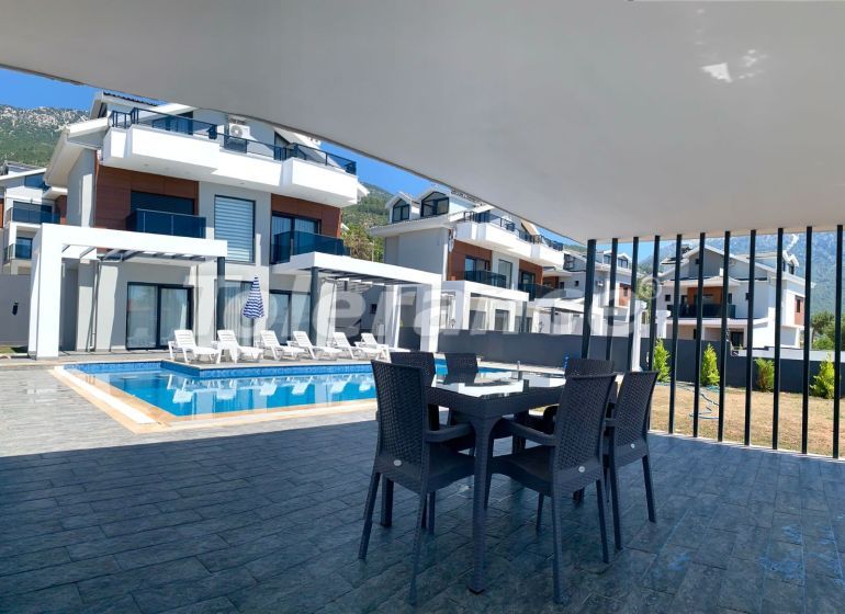 Вилла или дом в Оваджик, Фетхие вид на море с бассейном: купить недвижимость в Турции - 69994