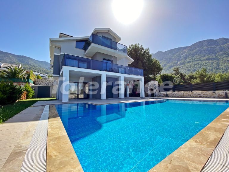 Вилла или дом в Оваджик, Фетхие вид на море с бассейном: купить недвижимость в Турции - 70017