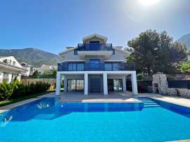 Вилла или дом в Оваджик, Фетхие вид на море с бассейном: купить недвижимость в Турции - 70024