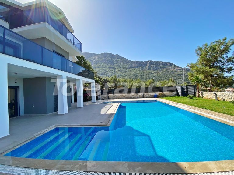 Вилла или дом в Оваджик, Фетхие вид на море с бассейном: купить недвижимость в Турции - 70035